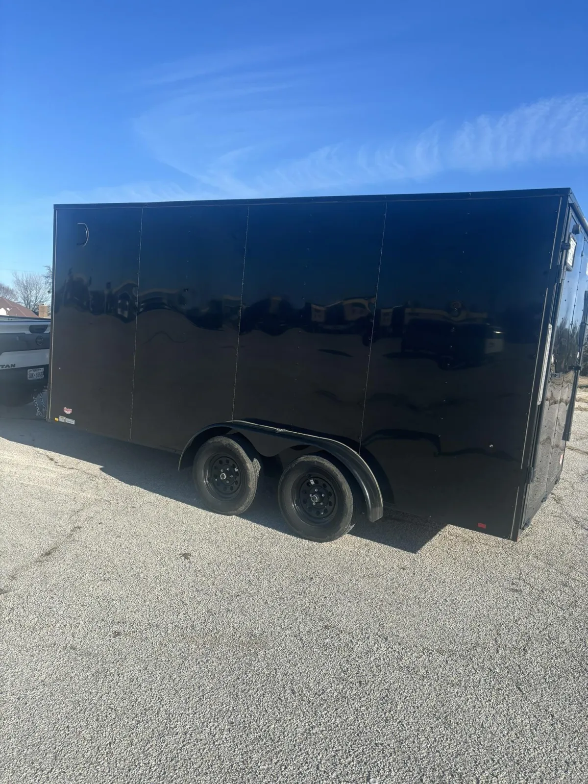 Black enclosed cargo trailer