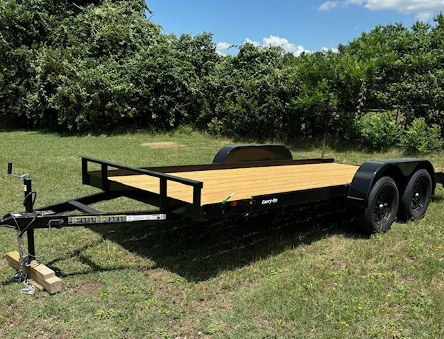 Black flatbed trailer with wooden deck